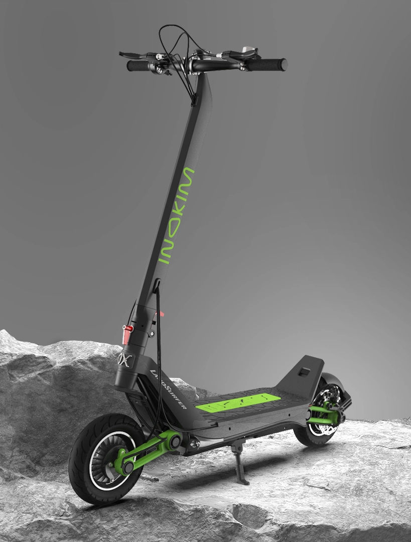inokim ox scooter on a grey rock backdrop